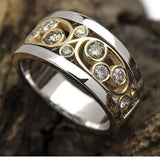Anillo vintage de oro y plata con circonita en forma de hiedra