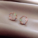Floral con circonita en oro