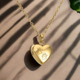 Collar con urna conmemorativa para mascotas – Colgante en forma de corazón con grabado de una pata