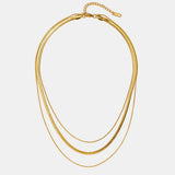 Collar de cadena dorada multicapa